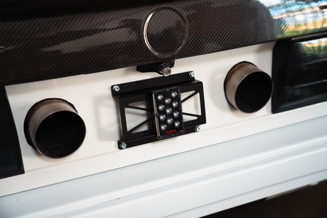 rain light bracket universal garagistic bmw e30 e36 license plate frame racecar track car 