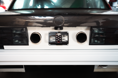 rain light bracket universal garagistic bmw e30 e36 license plate frame racecar track car 